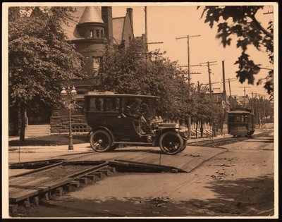 Automobile Crossing Over Trolley Tracks by William G. Swekosky